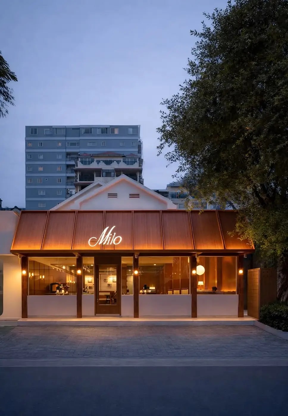 Warmly illuminated entrance to Milo restaurant