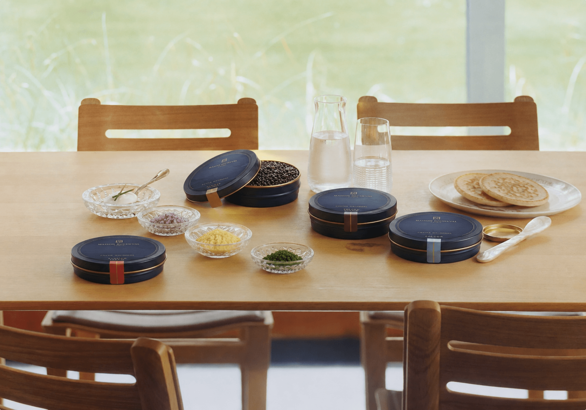 Maison Rocheval caviar tins arranged for a tasting ritual